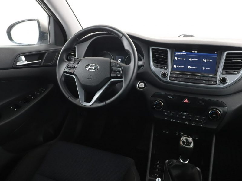 Hyundai Tucson klima auto grzane fotele navi bluetooth PDC III (2015-2020)