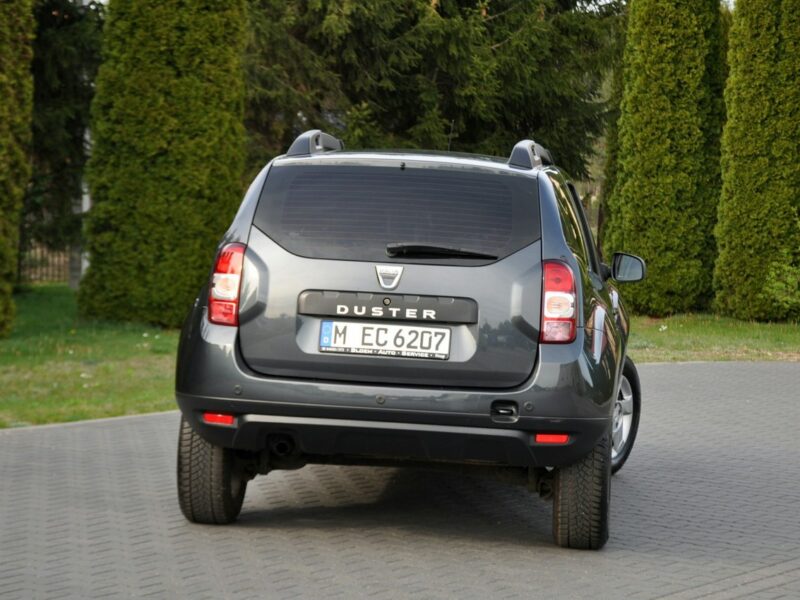 Dacia Duster 1.2i(125KM)*116tyś.km*Kolorowa Navi*Welur*Reling*Parktronik*ALU 16"ASO I (2009-2017)