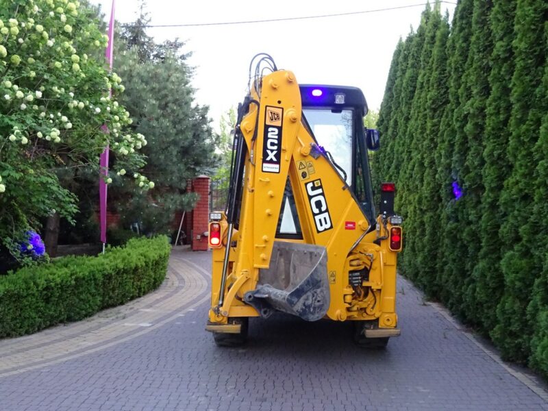 na równych kołach JCB 2CX SM 4 WS JCB 2CX 4x4 Compact koparko-ładowarka 2 łyżki dodatkowe Sprowadzona