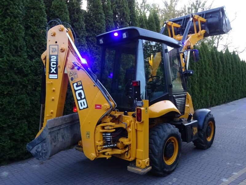 na równych kołach JCB 2CX SM 4 WS JCB 2CX 4x4 Compact koparko-ładowarka 2 łyżki dodatkowe Sprowadzona