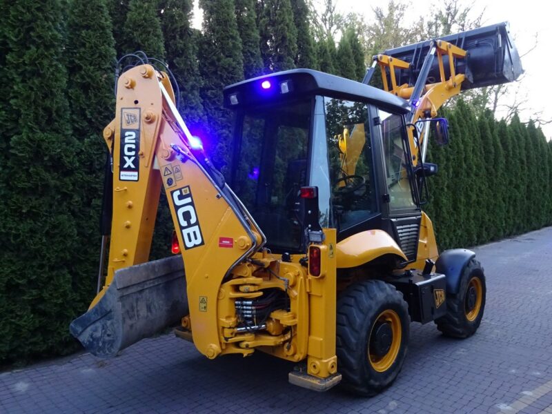 na równych kołach JCB 2CX SM 4 WS JCB 2CX 4x4 Compact koparko-ładowarka 2 łyżki dodatkowe Sprowadzona